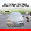 Maruti Fronx car covered in silver cover with birds Fronx Car Cover Waterproof protects paint from droppings and scratches