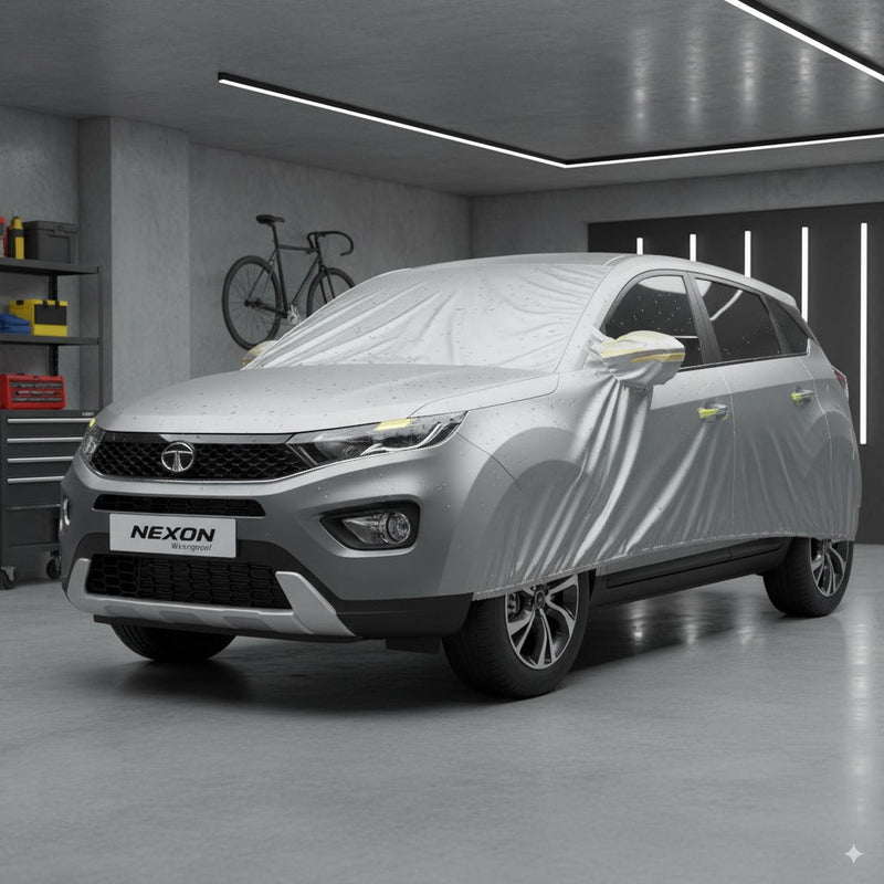 Tata Nexon Car Cover protecting a stylish grey Tata Nexon in a modern garage setting